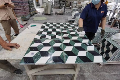 L'artigianato cinese della pietra costruisce un punto di riferimento alberghiero di lusso in Iraq: il gruppo Dongxing crea uno spazio d'arte in marmo con un'eccellente maestria artigianale