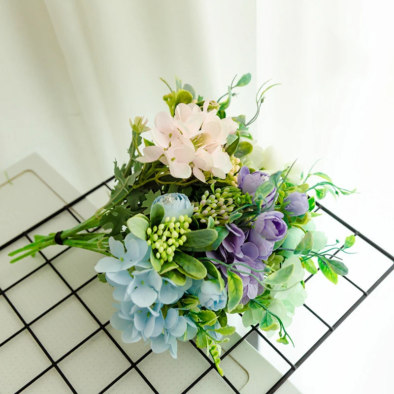 Mini bouquet di rose con capolini