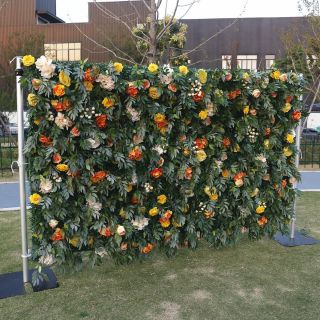 Decorazione del fondale da parete con foglie di fiori artificiali