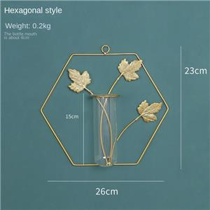 Decorazione da parete con anello in metallo con vaso di vetro