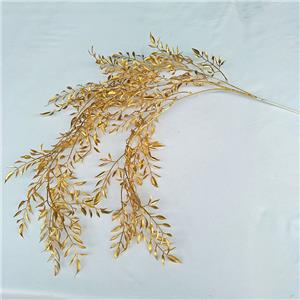 Bouquet di piante dorate in plastica artificiale