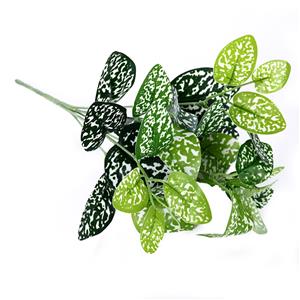 Decorazione domestica con mazzo di foglie artificiali