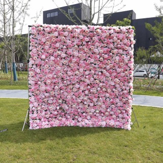 Sfondo di muro di fiori artificiali rosa
