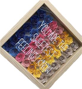Confezione regalo con rosa artificiale