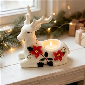 White Ceramic Reclining Deer Figurine with Red Poinsettia Relief - Festive Holiday Home Decor Accent