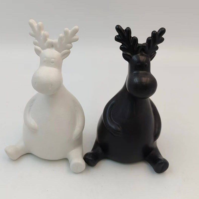 Minimalist Matte Ceramic Reindeer Figurine | Black & White Seated Deer Sculpture | Abstract Antler Design | Modern Nordic Tabletop Home Decor