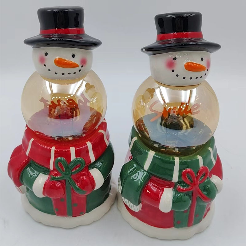 Gift-Hugging Snowman Snow Globe Ceramic Figurine, Light-up Christmas Snowman Decor (Red Scarf / Green Scarf)