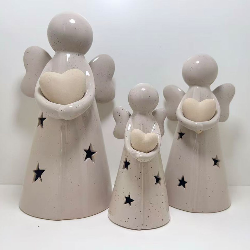 Speckled Cream Ceramic Angel Figurine Set of 3, Hollow Star Cut‑Out, Holding Textured Heart, Neutral Tone Christmas Tabletop Decor