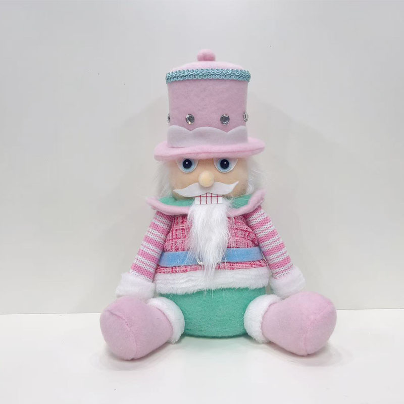 Sitting Fabric Nutcracker Soldier Figurine, Pastel Pink Top with Green Pants, Rhinestone‑Decorated Tall Top Hat, Vintage Christmas Tabletop Home Decor