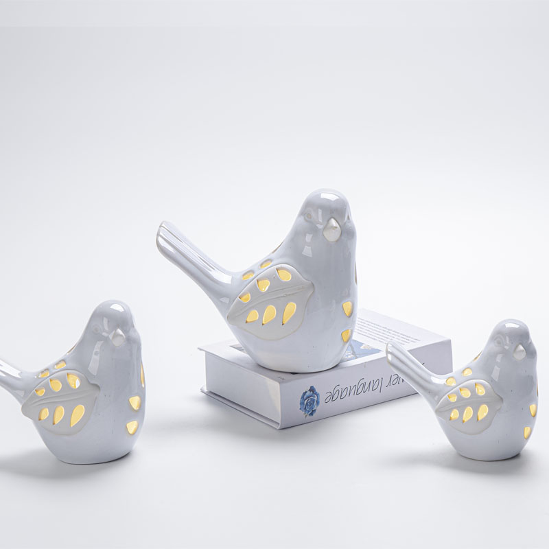 White Ceramic Hollow Bird LED Light Figurine, Leaf-Shaped Cutout Wings, Spring Tabletop Decor