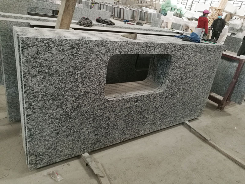 spray white granite slabs