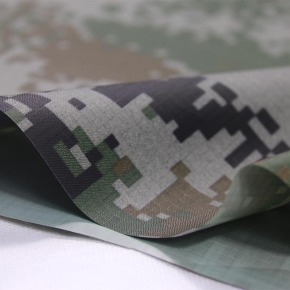 Flame retardant camouflage fabric