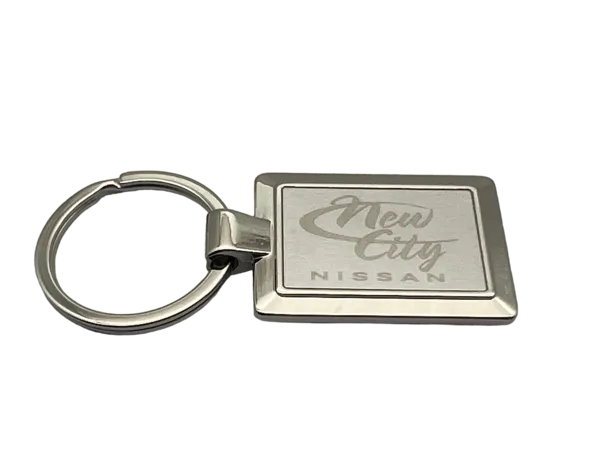Porte-clés entièrement en métal avec gravure laser du logo de la marque