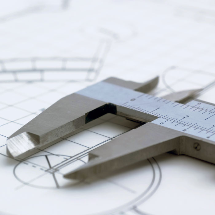 Why do magnets attract iron but not copper and aluminum?