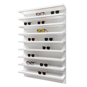 Tienda de gafas con 8 estantes de acrílico para gafas de sol.