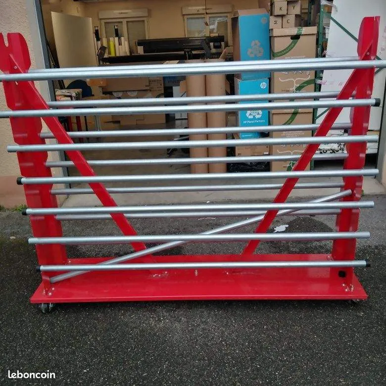 red metal roll display rack