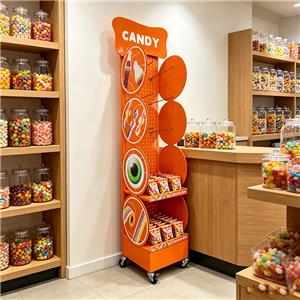 Low impulse buys? Can orange floor candy display racks win?