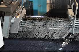 Automatic warp drawing machine