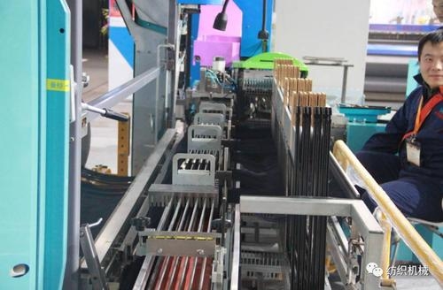 automatic drawing-in system