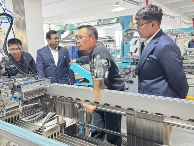 Indian customers came to visit the automatic warp drawing machine