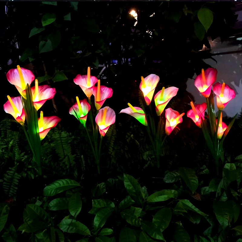 Solar calla lily trädgård blomma staket ljus