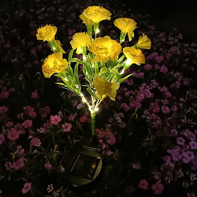 Luces de estaca con flores de clavel artificiales solares