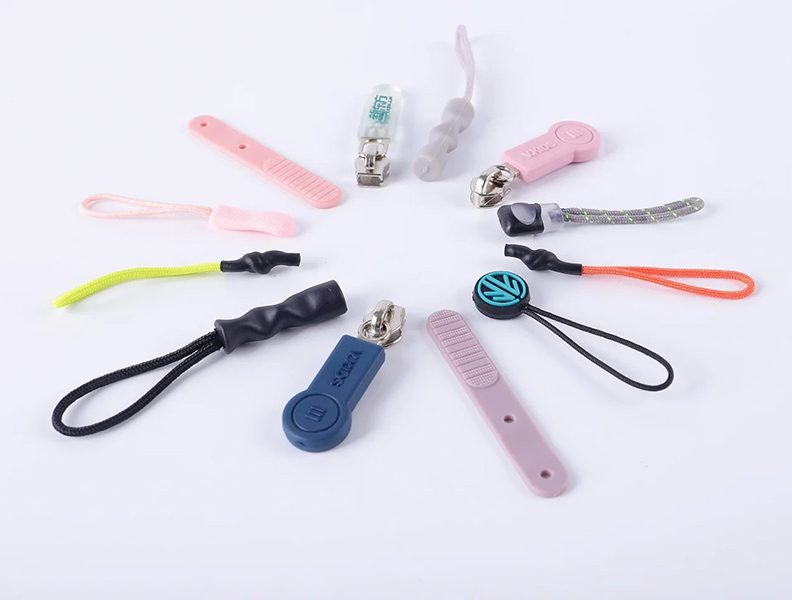 Processos de moldagem de puxadores de zíper de silicone e outros