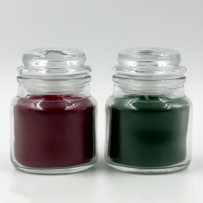 Vela en tarro de vidrio perfumada