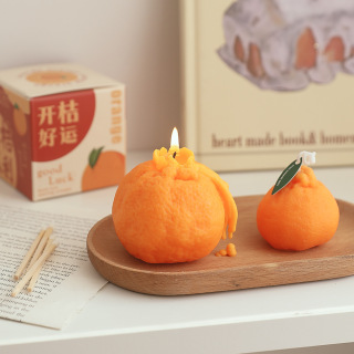 Velas de cera para decoración de escritorio con apariencia naranja