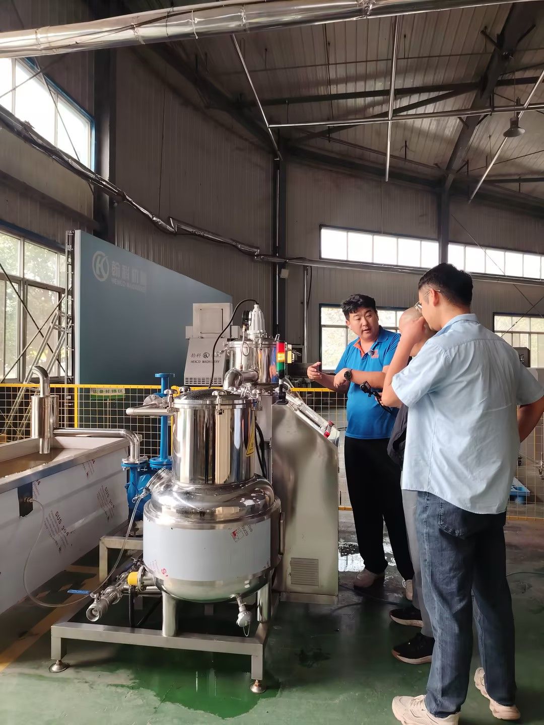 Engineer walking the customer's team through the machine, vessel and piping step by step