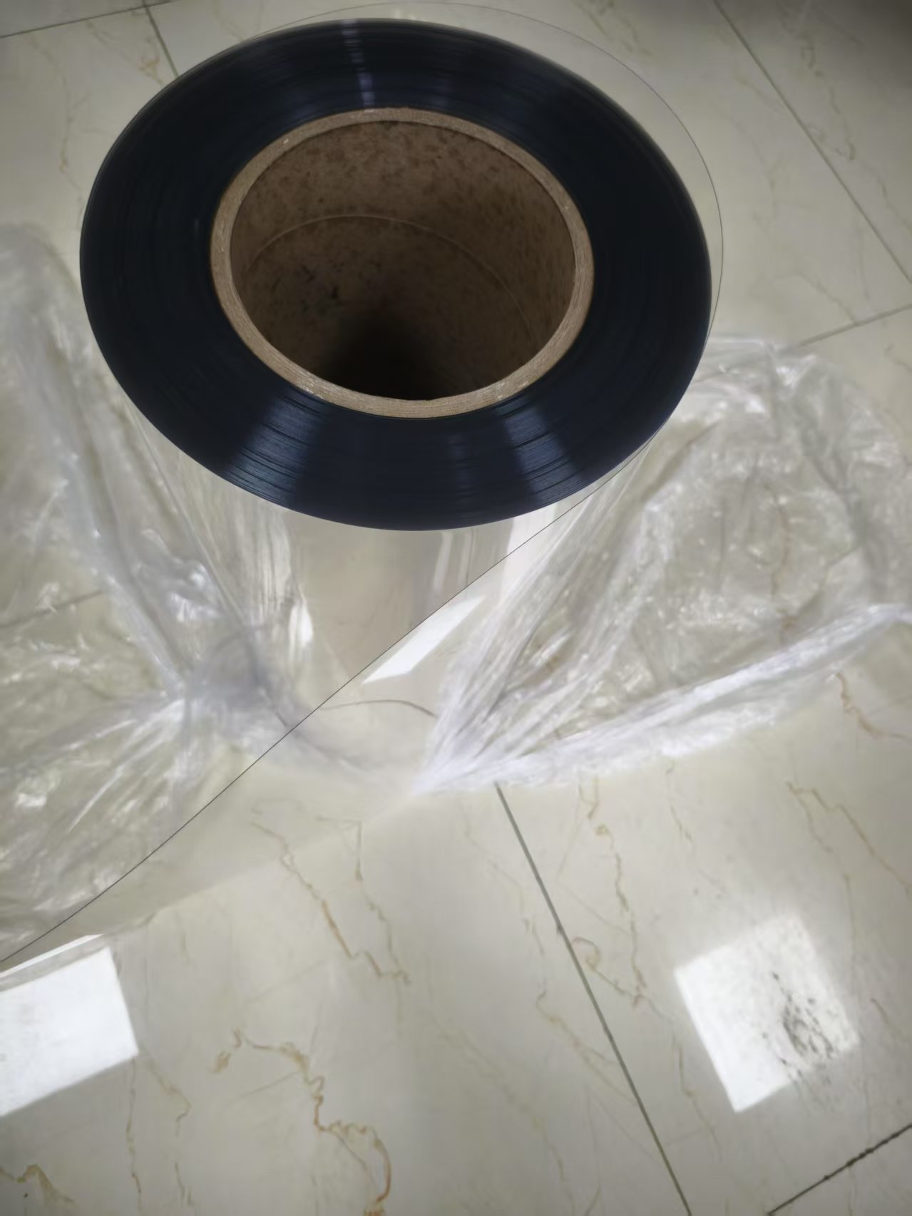 Highly transparent PET rigid film