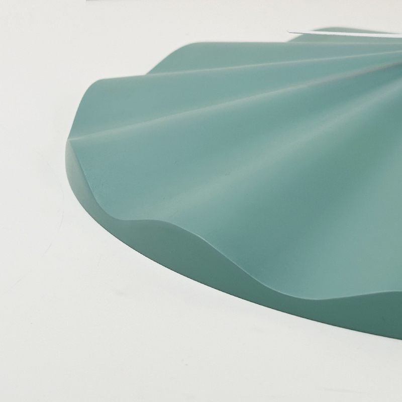 ساعة حائط بلاستيكية على شكل صدفة