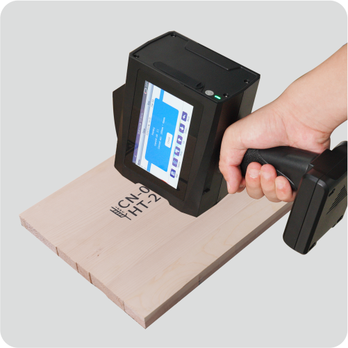 Dvouhlavou velkoplošnou 2palcovou ruční tiskárnu 50 mm lze použít pro venkovní dřevěnou grafiku QR Code