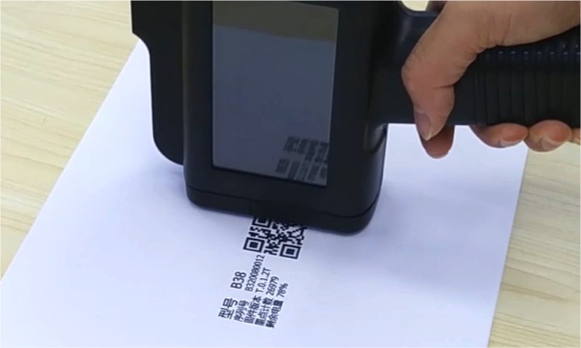 Handheld inkjet printer