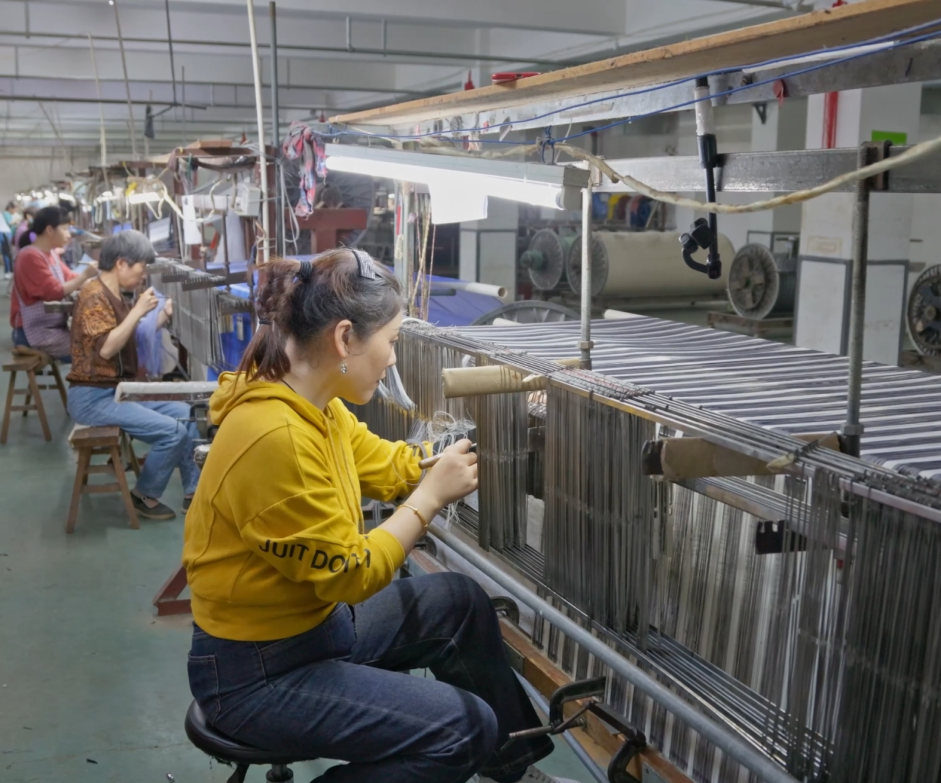 Xiao Hong Zhang: The Expert Hand in Yarn Preparation