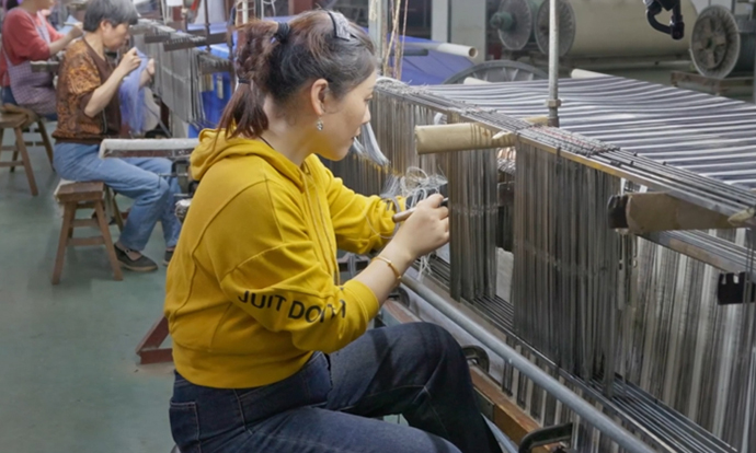 Xiao Hong Zhang : l'expert en matière de préparation du fil