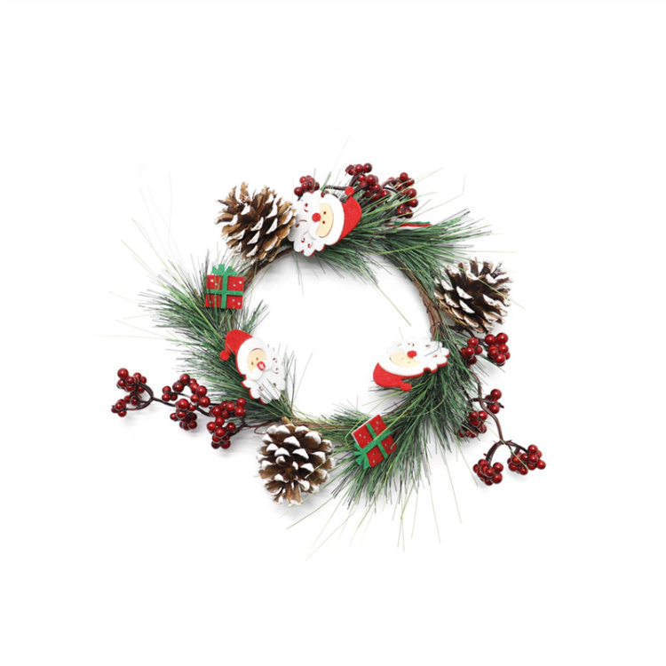 松ぼっくりのリースをドアや窓に吊るす