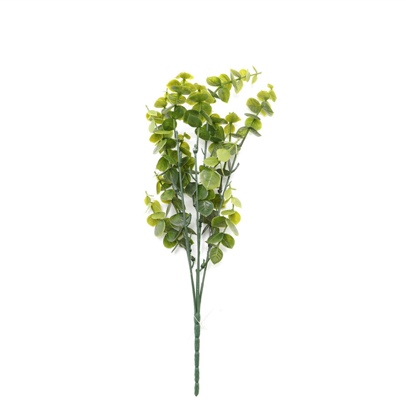 Green Plant In A Vase On A Table Decoration