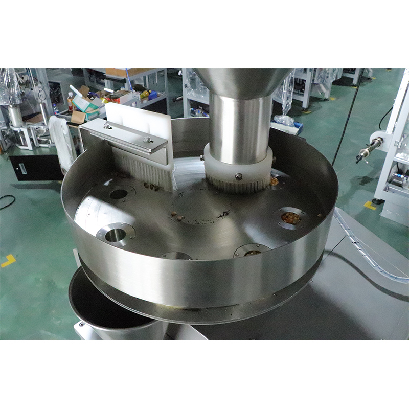 Máy đóng gói đứng có bộ nạp cốc đong
