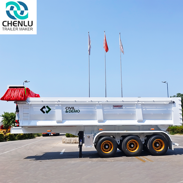 Delivering a white dump trailer with electric tarpaulin to customers and showing the factory