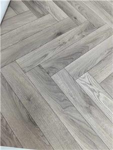 What are the differences between the new herringbone laminate flooring and the past