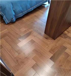 Solid wood herringbone laminate floor