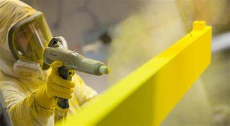 Powder spraying process