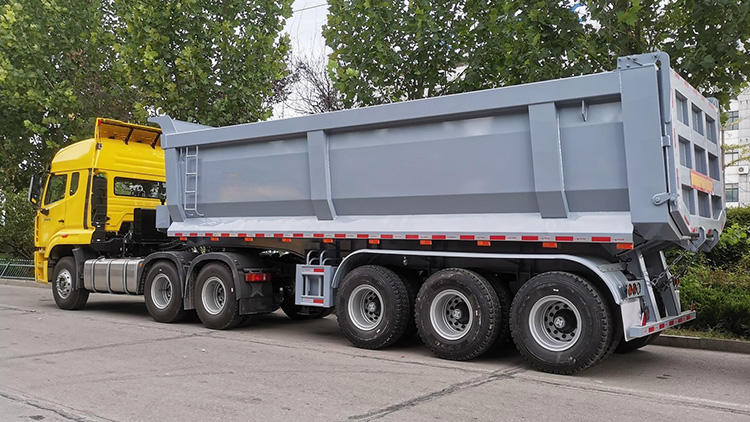 Tri axle dump truck trailer