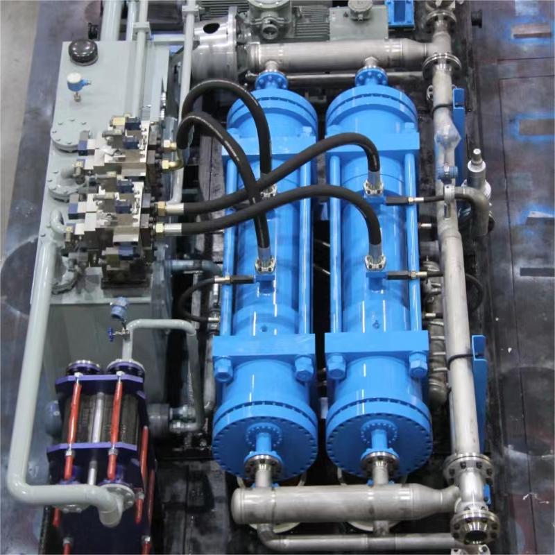 fluorine gas hydraulic driven compressor