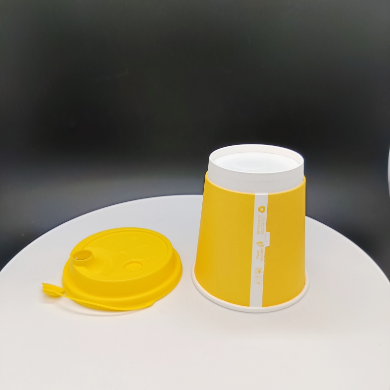 Yellow paper cup with lid