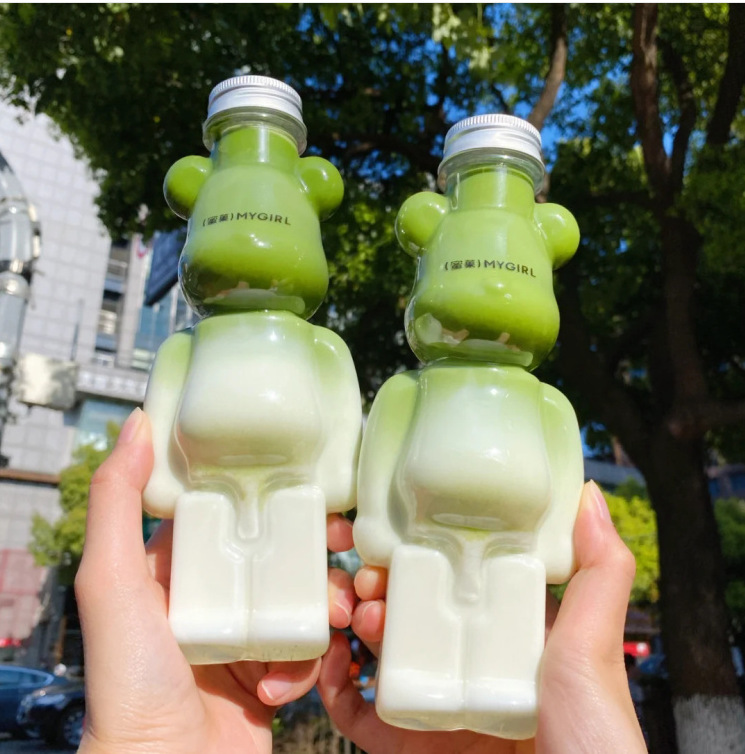 New fashion disposable PET juice bottel bear plastic bottle with cap