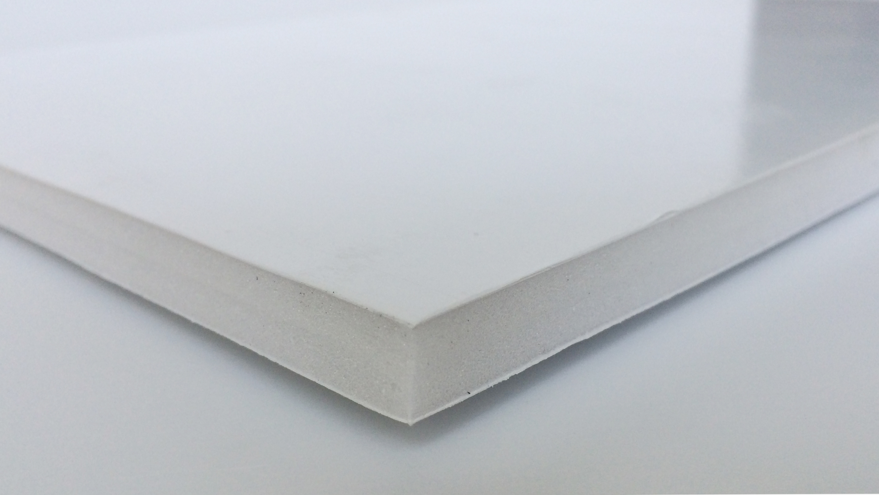 Adhesive foamboard