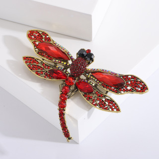 Rote Libellenbrosche