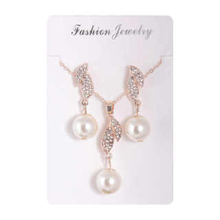 Набор серег и ожерелья с кристаллами розового золота